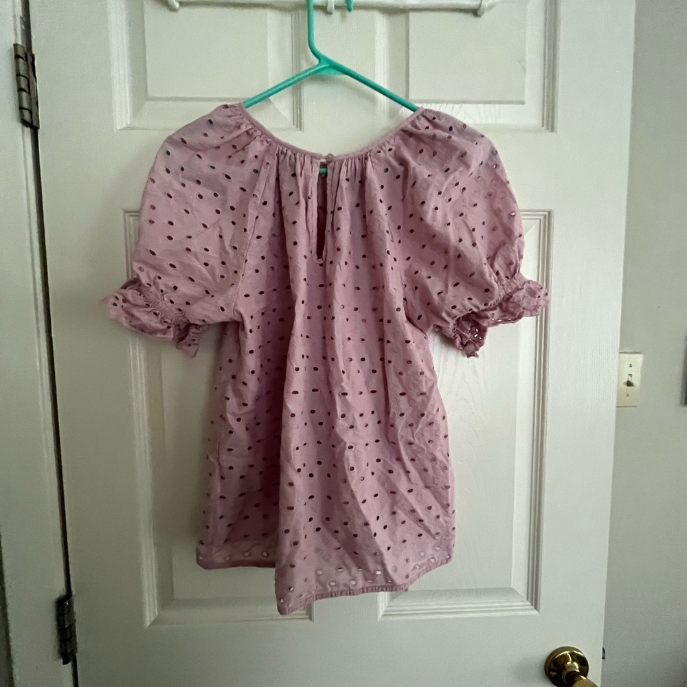 pink shirt with puffy sleeves!